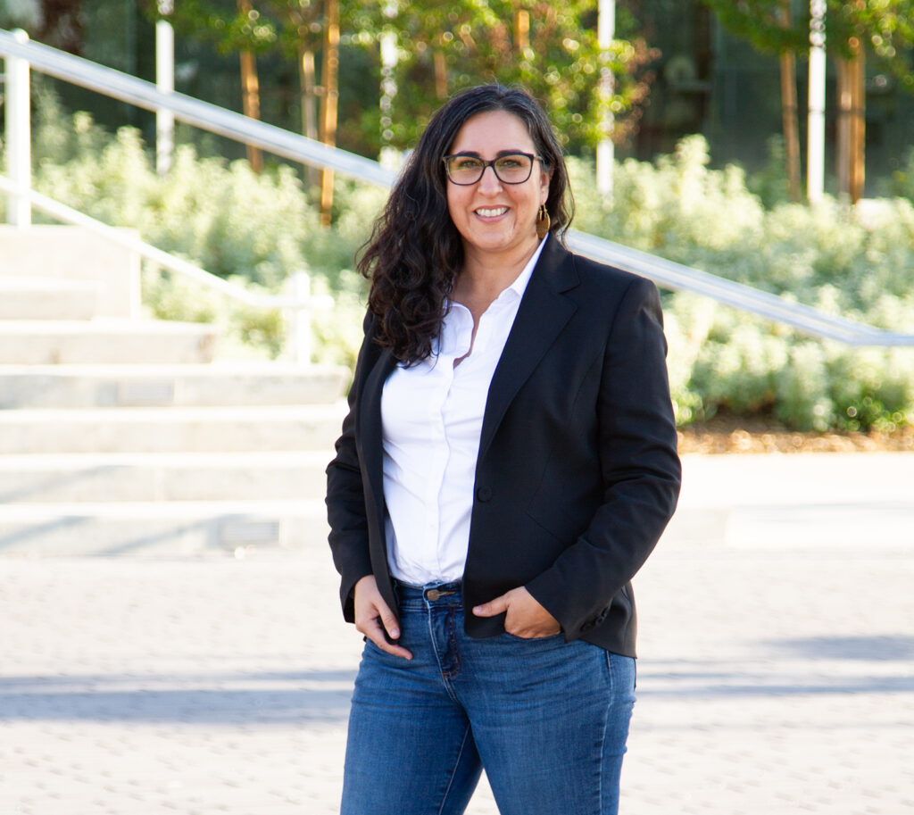 Nasreen Johnson standing in front of the new Fresno City College West Fresno Campus